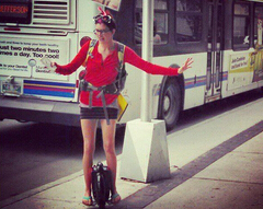 What is the staff of the Chicago Jazz Festival riding an Airwheel electric self-balancing scooter?